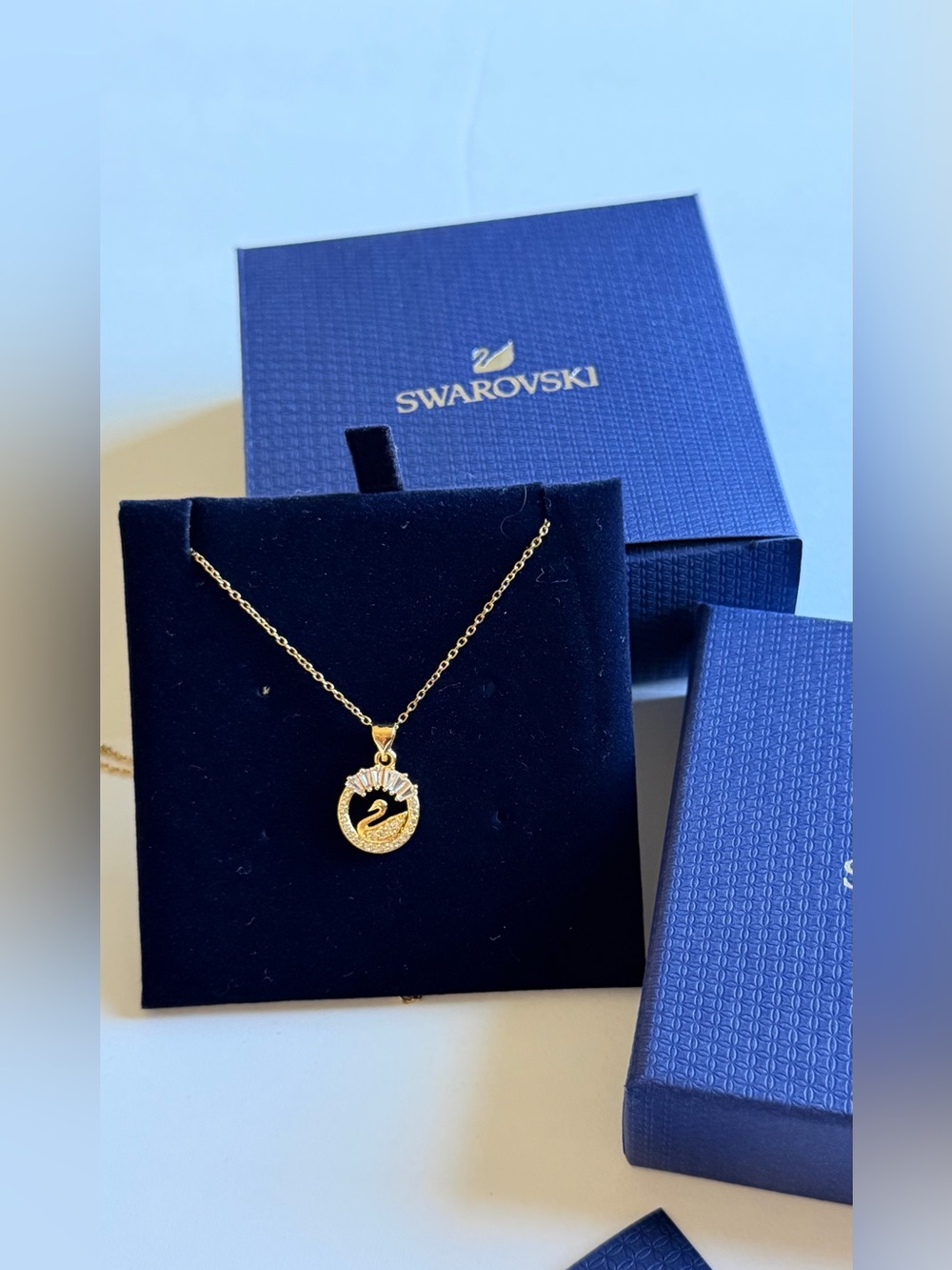 Swarovski Gold Swan Circle Pendant Necklace with Blue Packaging
